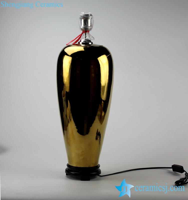 golden/silver trophy shape ceramic book lamp