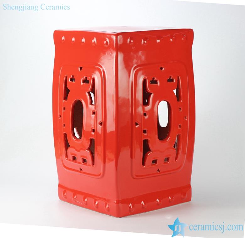 red hollow out ceramic home stool