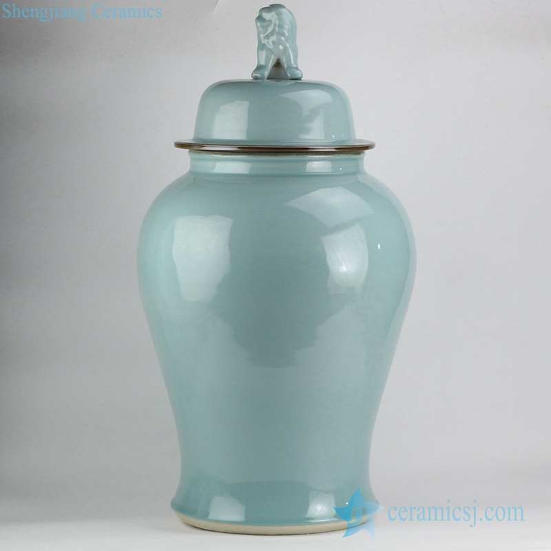 green vase with lid