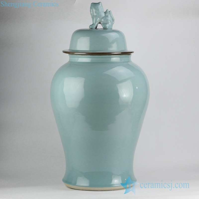 green vase with lid