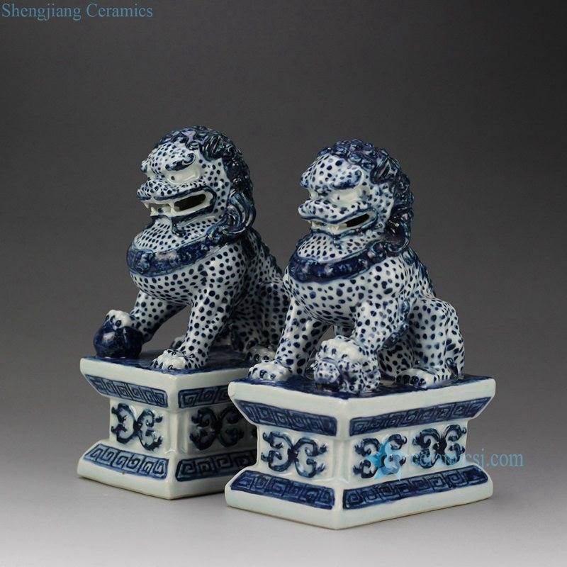 Blue and white pair of ceramic sitting lions book end