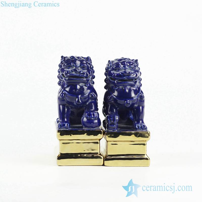 Temple gate keeping guard indigo blue pair lions porcelain sculpture with gold base