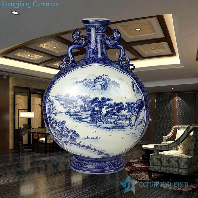 Hand paint blue and white mountain and river pattern ceramic holding moon shape vase with lion lug
