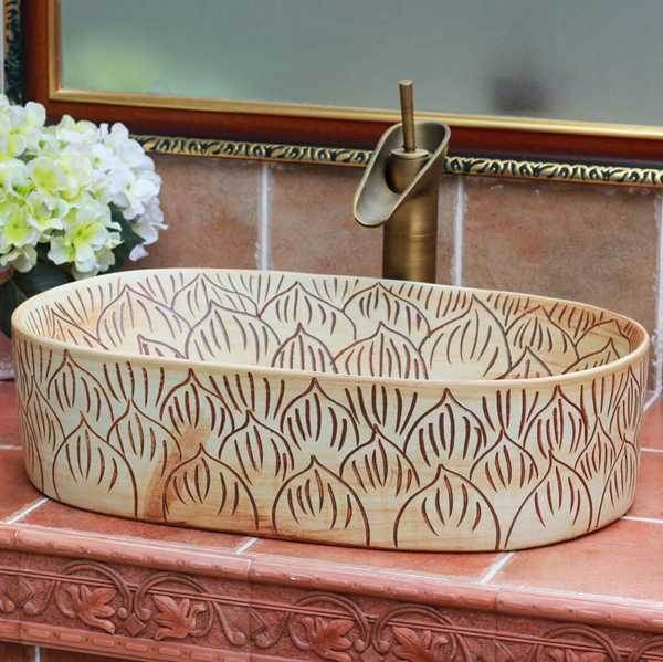TPAA-102-w56×33×15j3135 TPAA-102 Carved lotus petal design oval clay washing basin - shengjiang  ceramic  factory   porcelain art hand basin wash sink