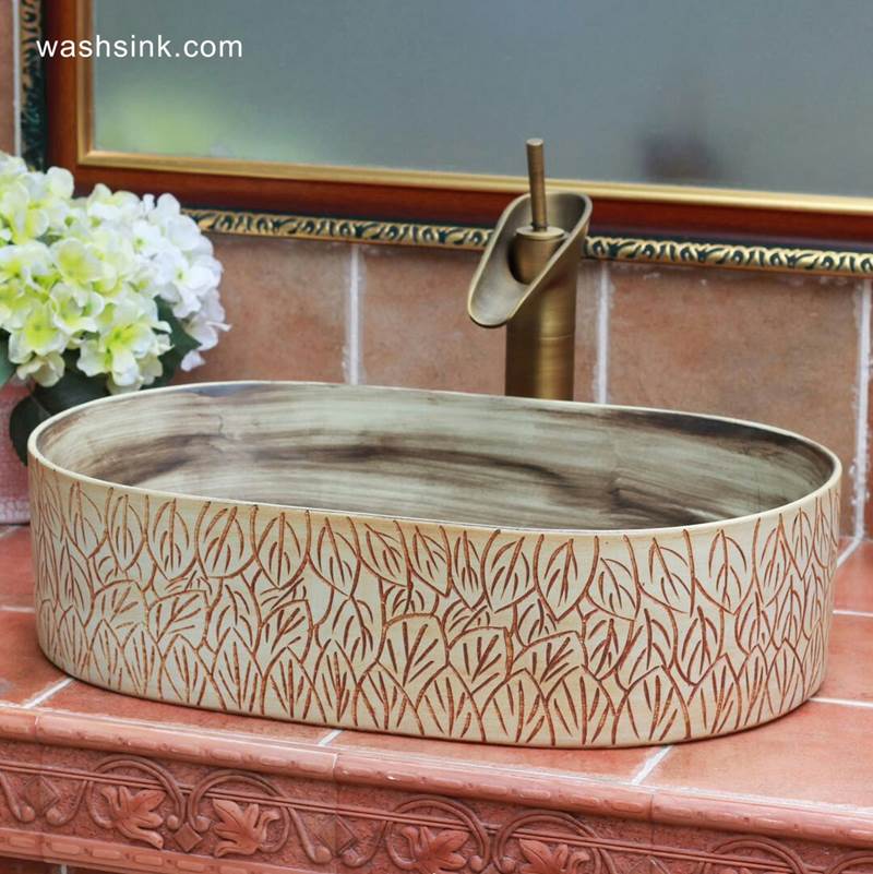 TPAA-104-w56×33×15j3135 TPAA-104 Crockery material leaves carving design oval best ceramic kitchen sinks - shengjiang  ceramic  factory   porcelain art hand basin wash sink