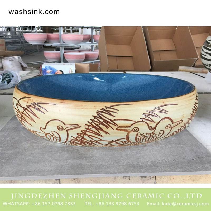 Chinese manufacture carved bird and reed pattern discount ceramic vessel sink