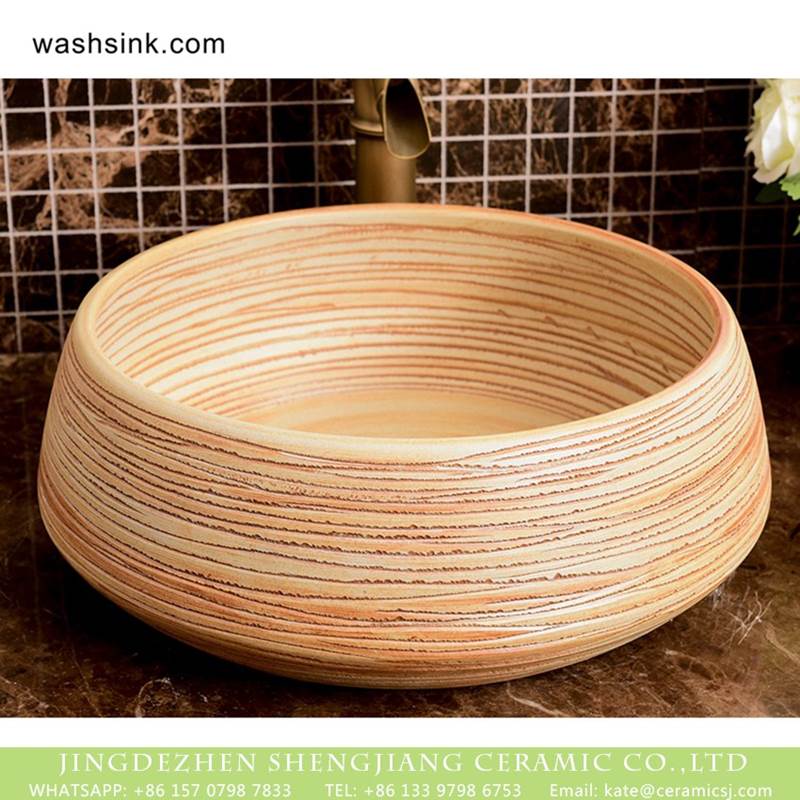Chinese factory direct art ceramic the wood color striation bathroom washing sink