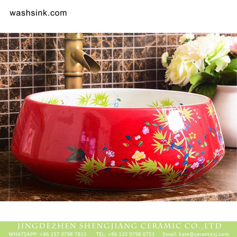 Shengjiang factory direct very smooth ceramic with light red color and flowers pattern wash basin