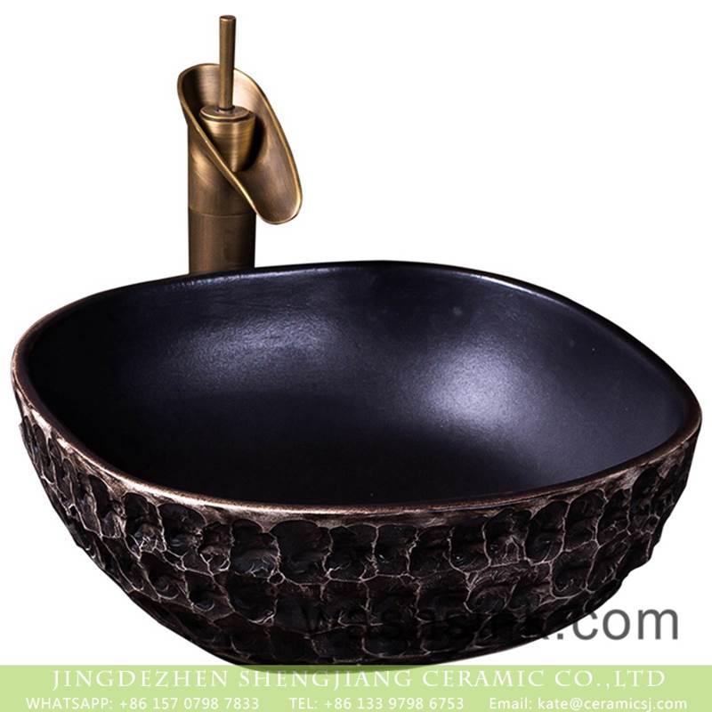 Jingdezhen Hand carved square black ceramic and uneven surface bathroom table top wash basin