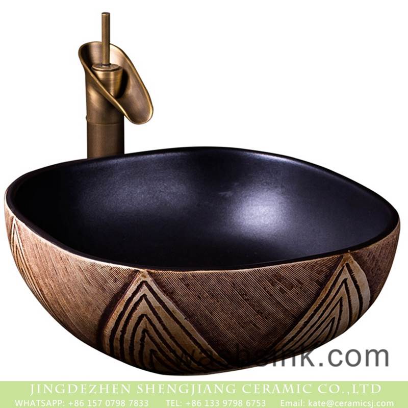China tradition high quality ceramic bright black color and the wood of pattern toilet basin