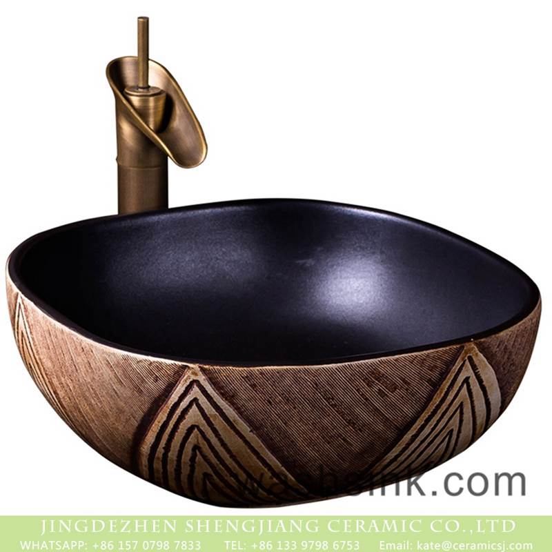 China tradition high quality ceramic bright black color and the wood of pattern toilet basin