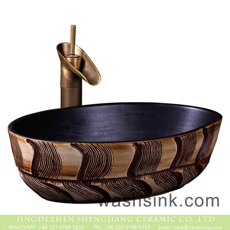  Made in China thin edge oval black porcelain with hand carved device art basin