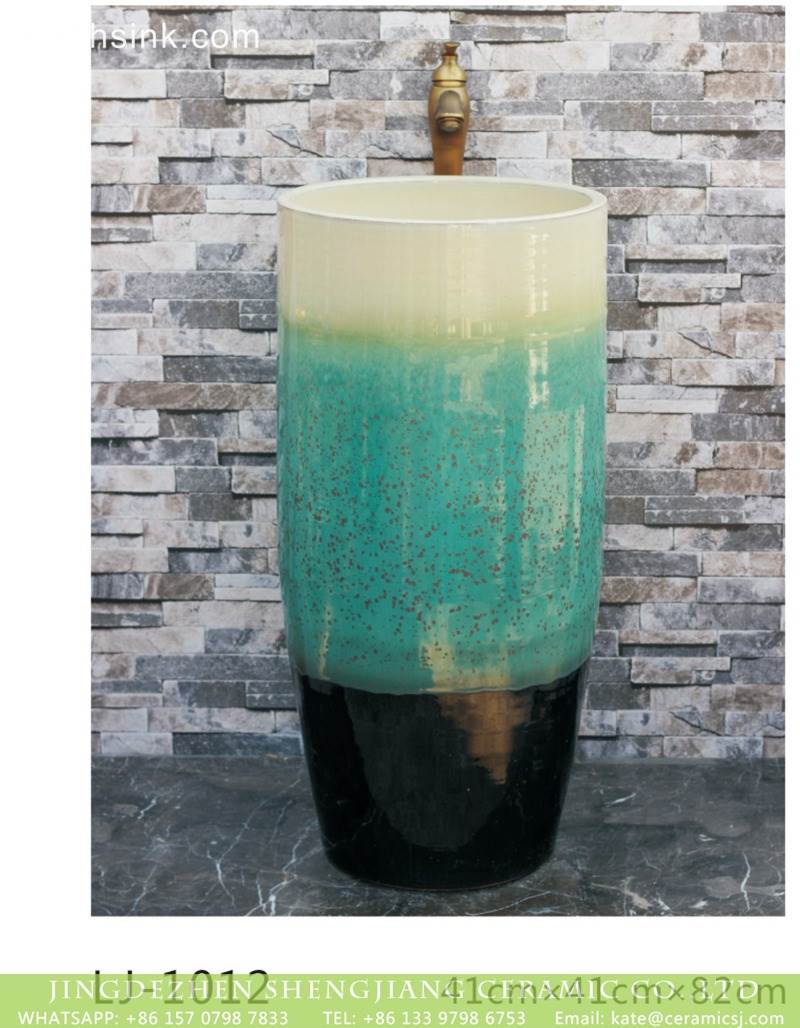 green and black glazed one-piece basin