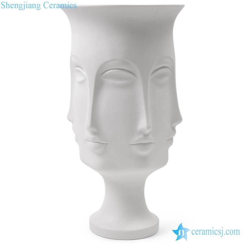 tall human face ceramic vase