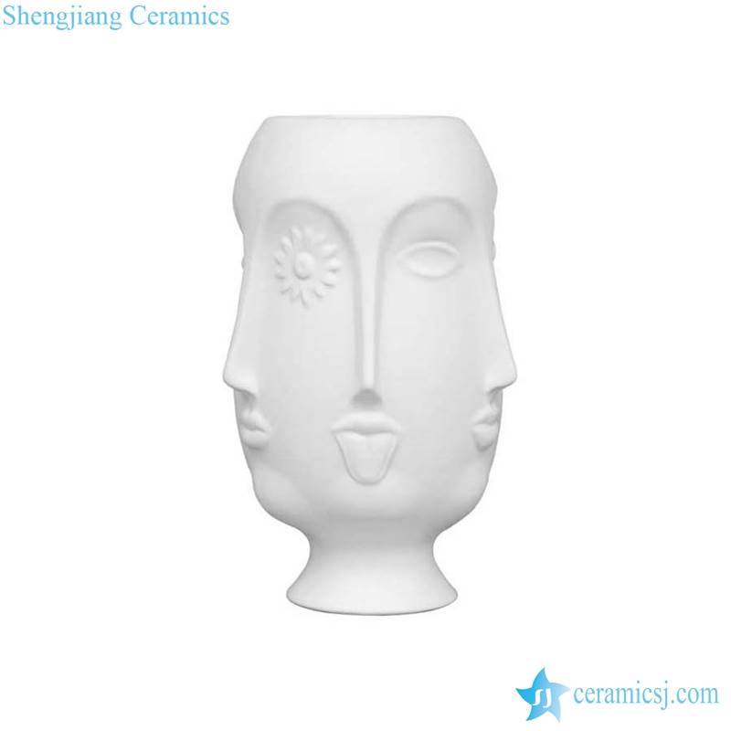 long human face ceramic vase