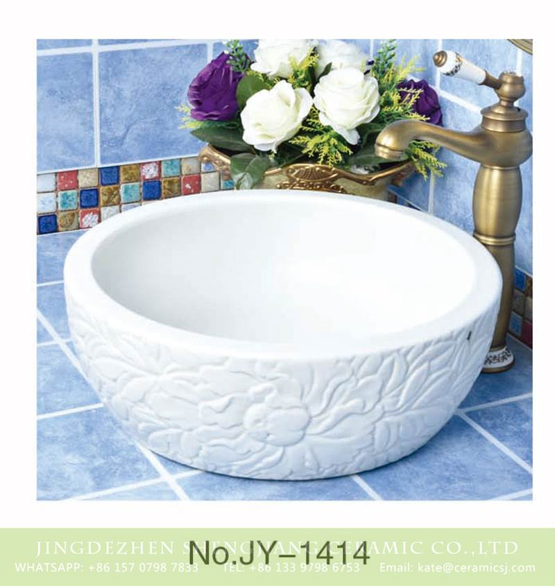 carved white lotus sink