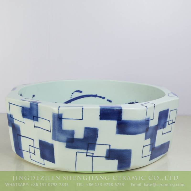 blue and white ceramic art basin