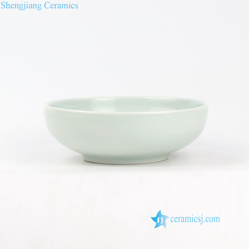 green and blue ceramic bowl