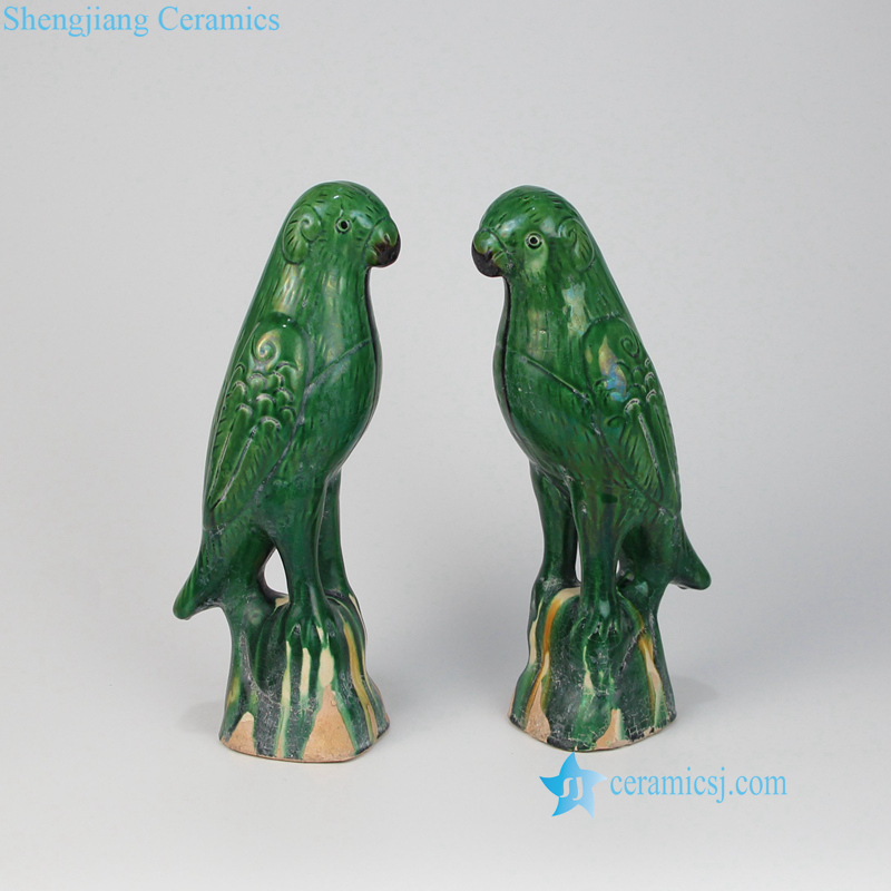 green ceramic parrot figurines
