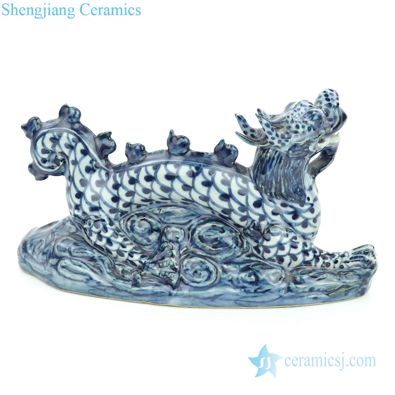 blue and white ceramic dragon statue