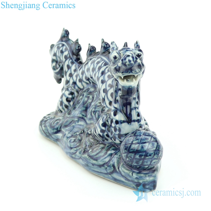 blue and white ceramic dragon statue
