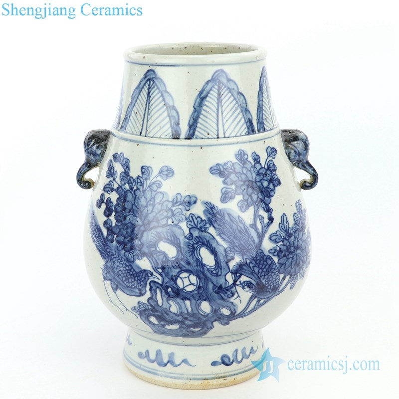 blue and white ceramic with two handles jar