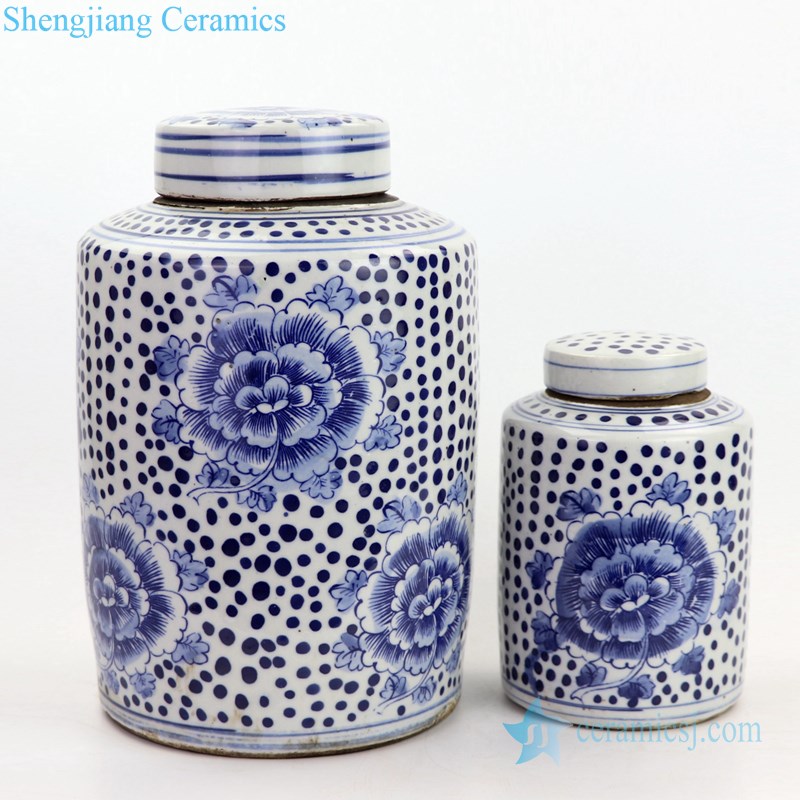 cylindrical blue and white ceramic jar