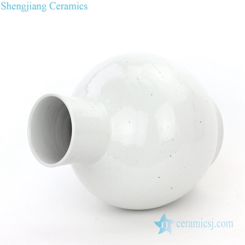 white ceramic globular vase