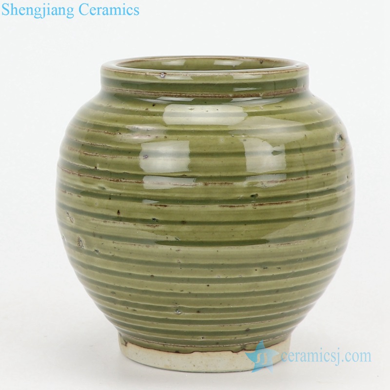 old green ceramic vase