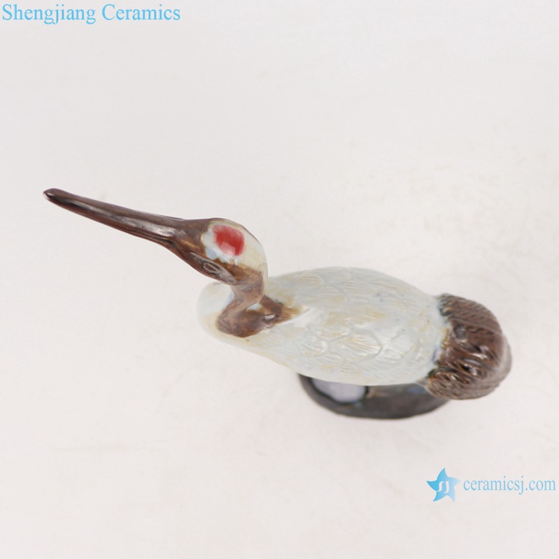 top view of Colorful glaze kiln changed glaze carving sculpture single feather crane