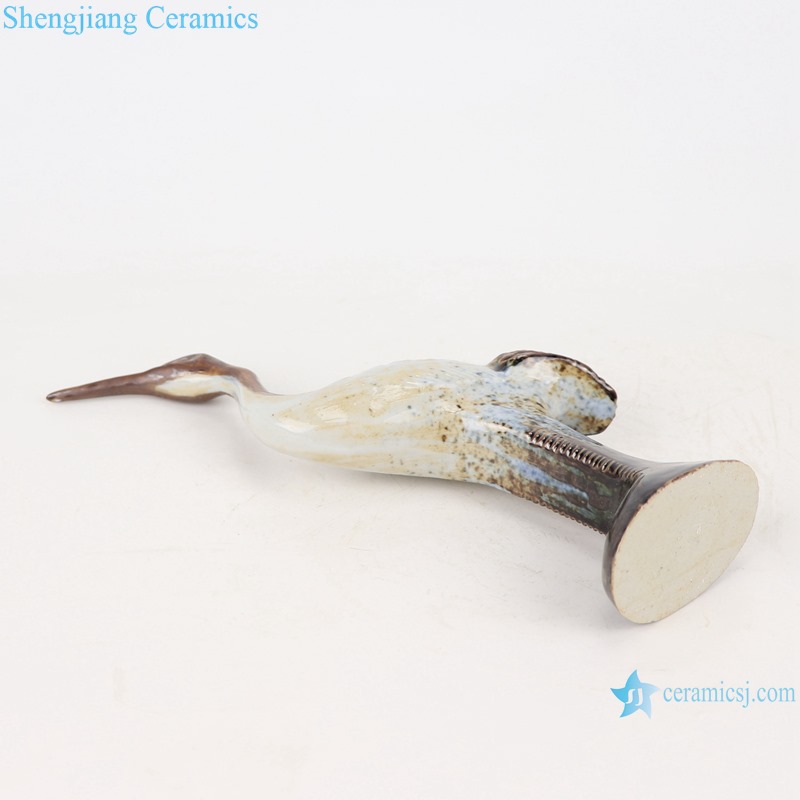 bottom view of Colorful glaze kiln changed glaze carving sculpture single feather crane