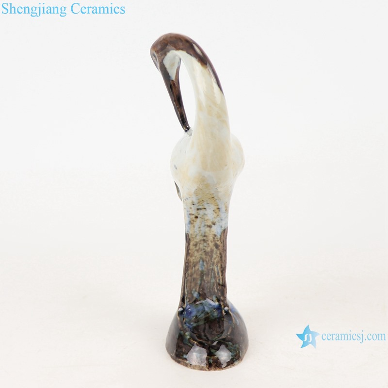 front view of Colorful glaze kiln changed glaze carving sculpture single feather crane