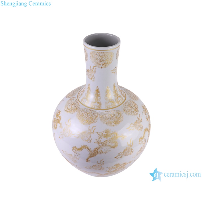 side view of white background golden color dragon pattern ceramic globular decorative vase