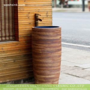 XHTC-Y-6008-4    Jingdezhen wholesale art design carved wood surface sink one piece unitary ceramic round pedestal basin