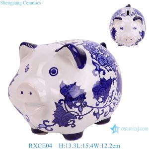RXCE04 Blue and white, flower and leaf patterned sculpture of a piggy bank